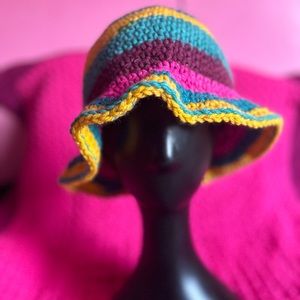 Handmade crochet multi color bucket hat by Dayscrochets_ on Instagram.